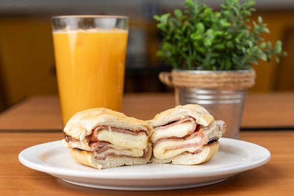 Try our grilled ham and cheese bread with coffee or juice