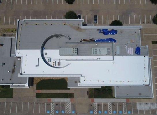 Flat roof repair in process.