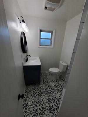 Took this bathroom from 1950s to modern day style