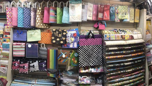 Large array of gift bags, wrapping paper, cards and ribbons!