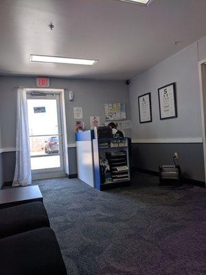 receptionist desk and front entrance (interior view)