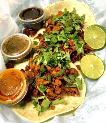 Pastor Tacos with three special sauces