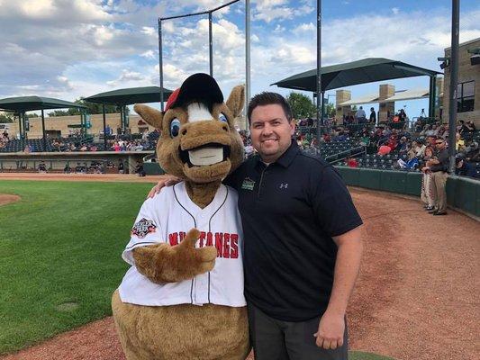 Dr. Gray and Homer at the Community Mustangs game night.