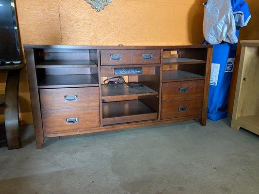 This desk cabinet has its own outlets and a keyboard pullout drawer!