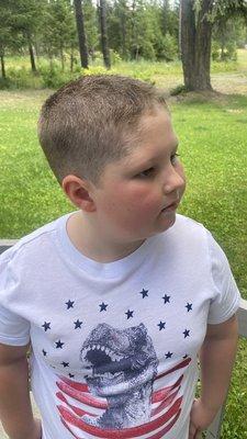 The "hair cut" or rather buzz cut he received today