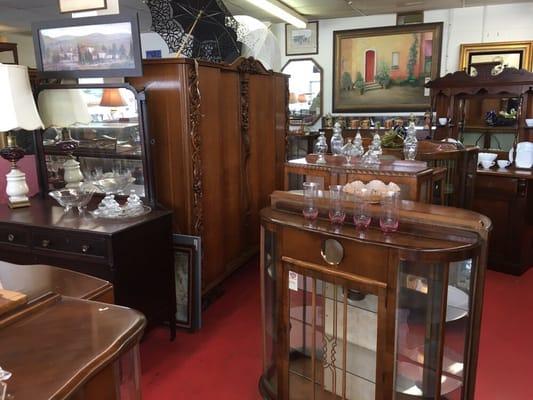 Large armoire, curio cabinets, artwork