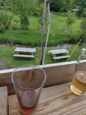 There are three picnic tables around back. This is the deck view (standing room only).