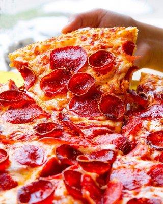 Our Pepperoni Duo is a large pizza smothered with our classic cupped pepperoni & our original pepperoni.