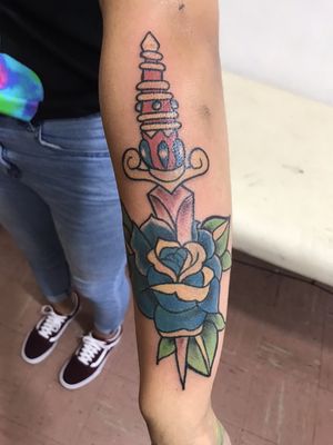 Nice color rose and dagger tattoo I recently did