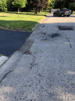 Sloppy mess they left when they sealed driveway.