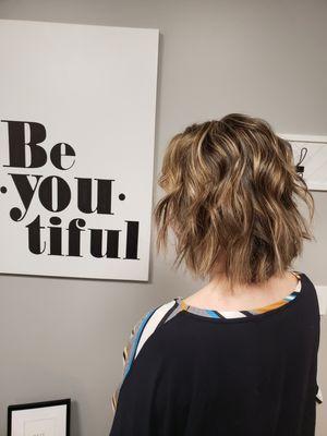 Short layerd bob haircut and highlights.