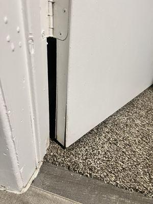 second bedroom door torn apartment and broken