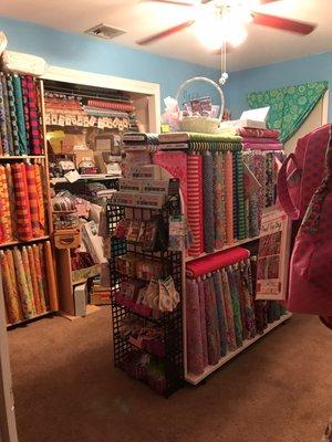 We carry Kaffe, Tula, Tim Holtz, Amy Butle3r, Anna Maria Horner, Kathy Doughty, FreeSpirit Solids, wide Backs, Jane Sassaman, and more.