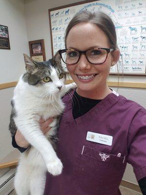 Rachel, a vet technician, with Mish, a clinic pet!