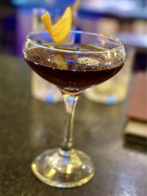 A smoky Black Manhattan