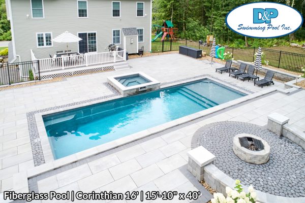 The beautiful Corinthian 16' pool from  @LathamPoolCorp  in Shale Gray with a Meridian Spillover Spa is looking fabulous! Hardscape by Desig