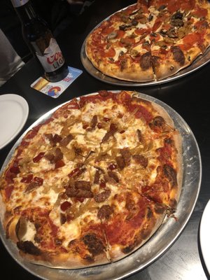 Elk sausage pizza and the supreme type pizza