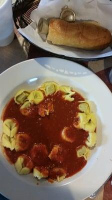 Tortellini with garlic bread.