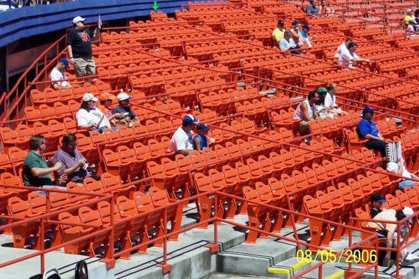 View of Shea stadium before we were contracted to remove all the seats. This photo shower the newer style orange seat.