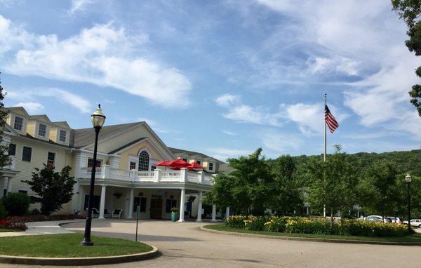 Colorful flowers and seasonal decorations welcome visitors.