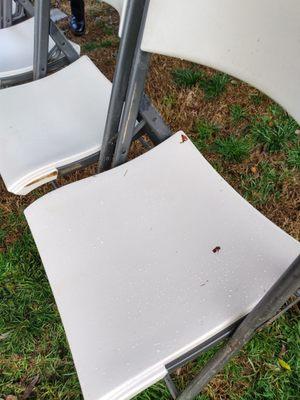 Set up for burial included 10 wet chairs complete with wet and muddy glove prints everywhere.