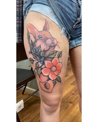 Rabbit and flower tattoo.