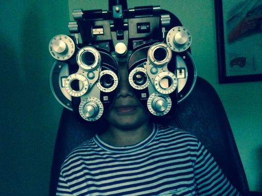 My 7 year old brother got his eye exam with the pediatric eye doctor. He thought this made him look like a transformer. :-)