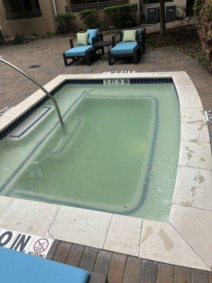 Cloudy green hot tub