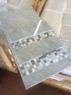 Found our carrerra marble ! And marble glass mosaic tile at a great price !