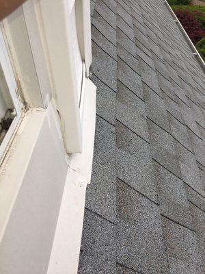 Nails put into exposed shingles by Water Tight