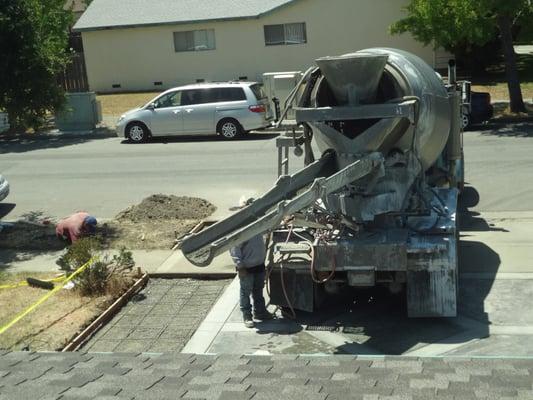 Tony delivering 8 yards of ready mix concrete (6 sack mix)