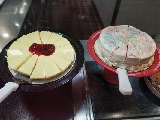 Cheesecake to the left cotton candy cake to the right