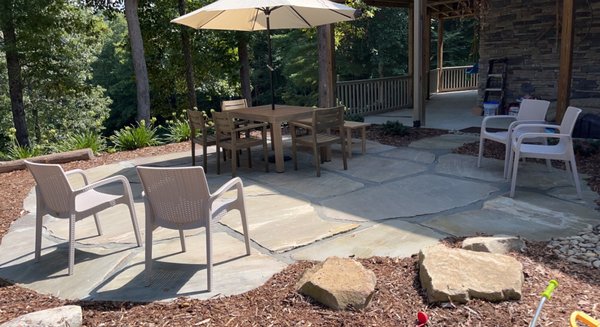 Sweet rock patio we did with adding fresh mulch around it