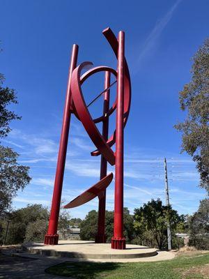 Large red steel sculpture created in 1990