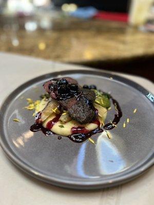 Coffee rubbed Colorado Elk + escarole + rutabaga + blueberry gastrique