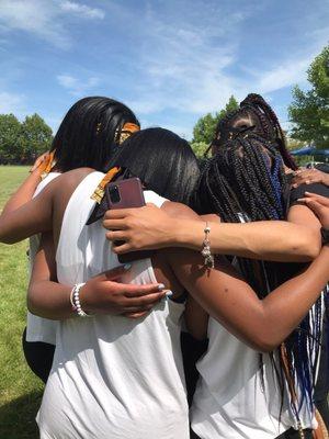 The 154 Project prepares to perform an intricate routing during a community Juneteenth event.