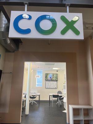 Cox Communications business front inside McGrath BizTown.