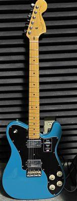 Pete setup this Tele Deluxe after I added new tuners and a bridge to it.