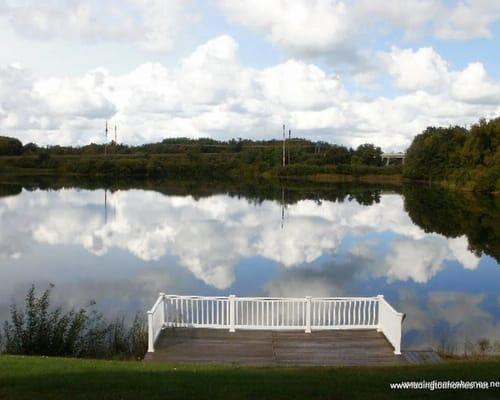 Century 21 Bayshore overlooks Rose Lake.