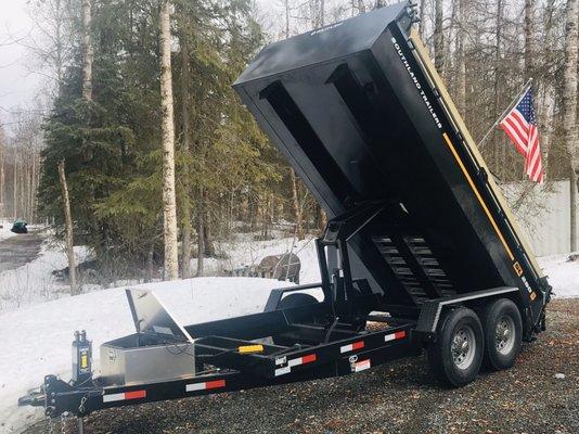 Dump trailer, full tilt