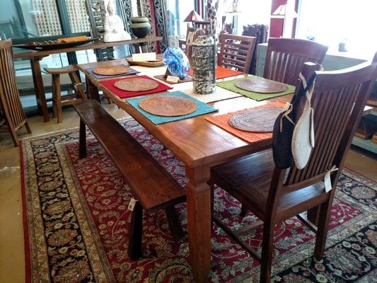 Live edge table with vetiver mats and woven mats. Side chairs are sold separately.