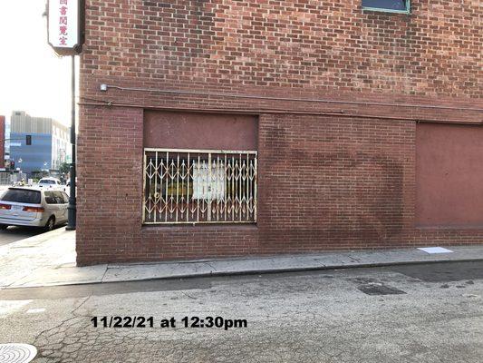 Entrance to Bamboo Lane from Broadway. No signage stating "Private Property" or "No Parking"