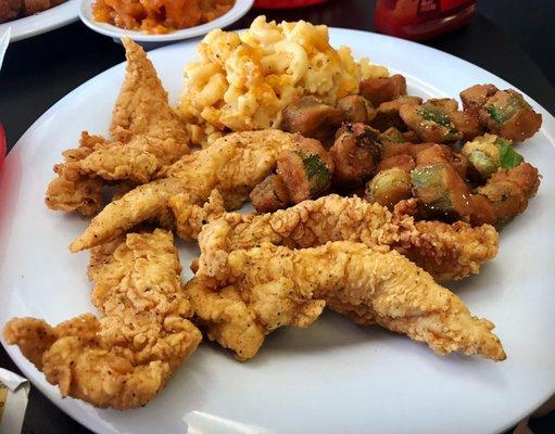 Chicken tenders, fried okra, and Mac and cheese.  You can see the yams in the back if you look closely!