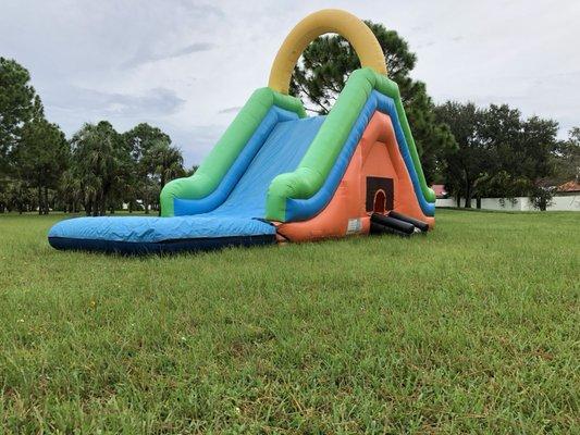 Water slide with bounce house inside and pool!