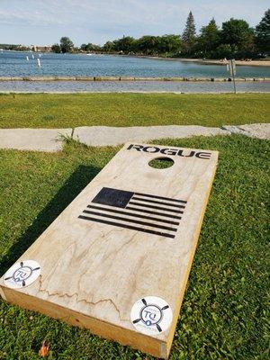 Play a little corn hole. Lawn games out for public play.