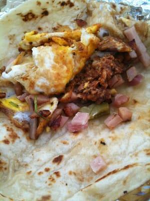 "Hamon" breakfast taco on flour tortilla.