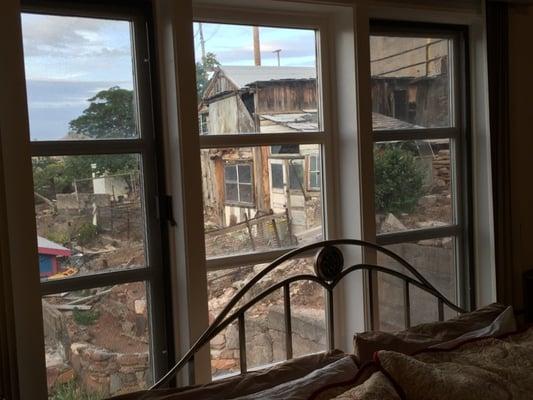 Looking at an old mining building through the window behind the bed!