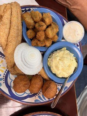 Catfish fried okra, mashed potatoes, hush puppies, onion slice, tarter sauce.