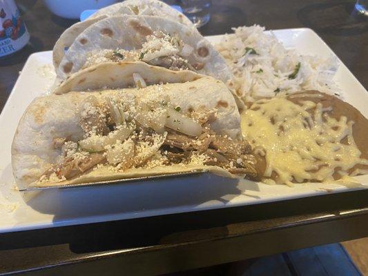 Carnitas Tacos with white rice....at a Mexican restaurant