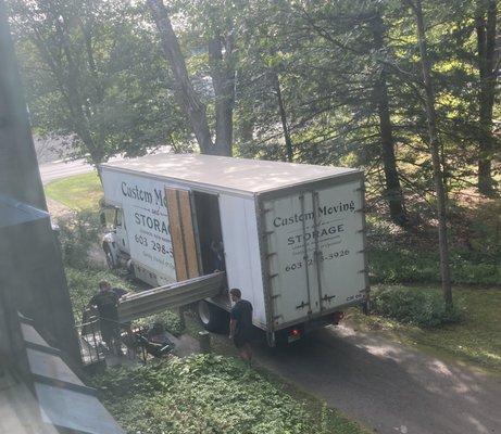 Getting the ramp set up to put things into the truck.